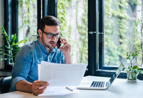 Man in office on the phone